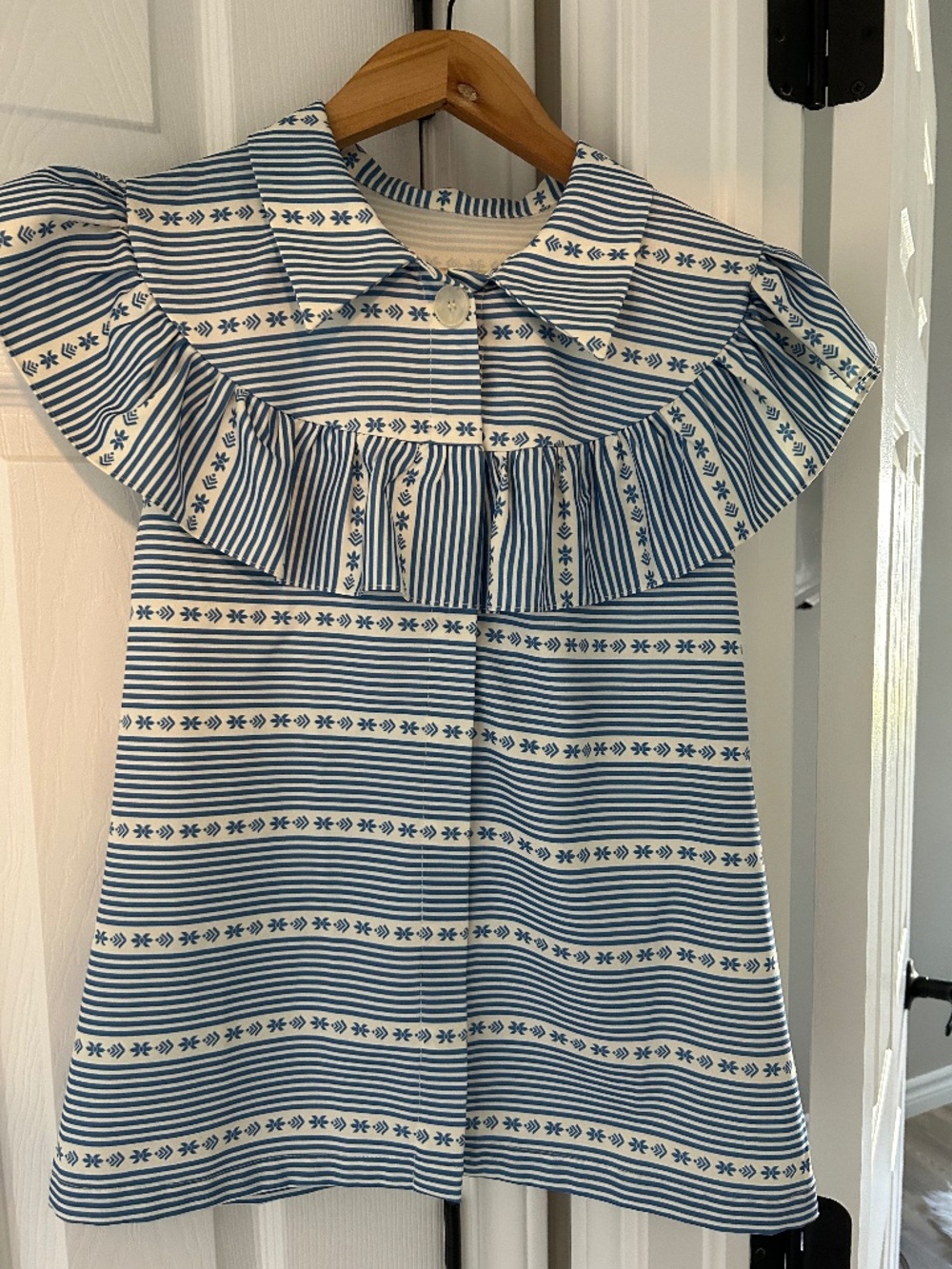 light blue striped ruffle blouse